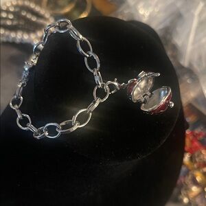 Elegant Silver Bracelet with Red Charm